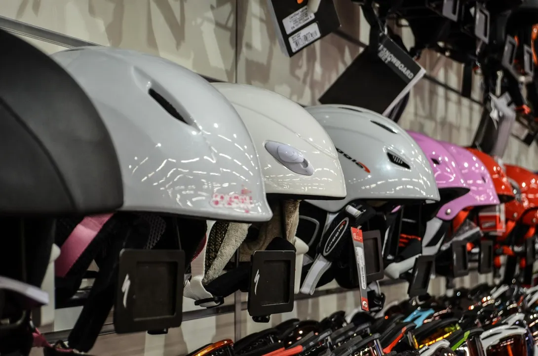 Ski helmets on a rack