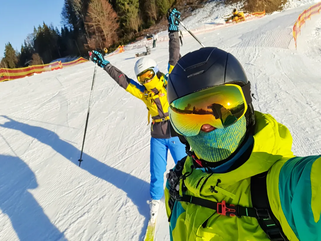 Couple skiing together