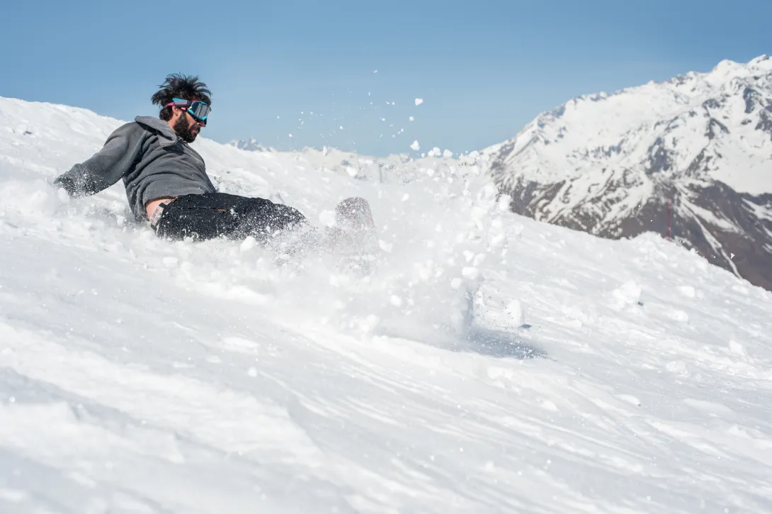 Falling snowboarder