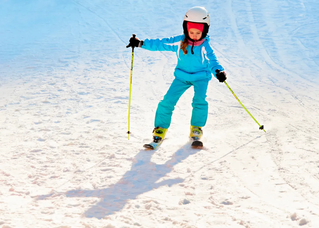Girl learning to ski